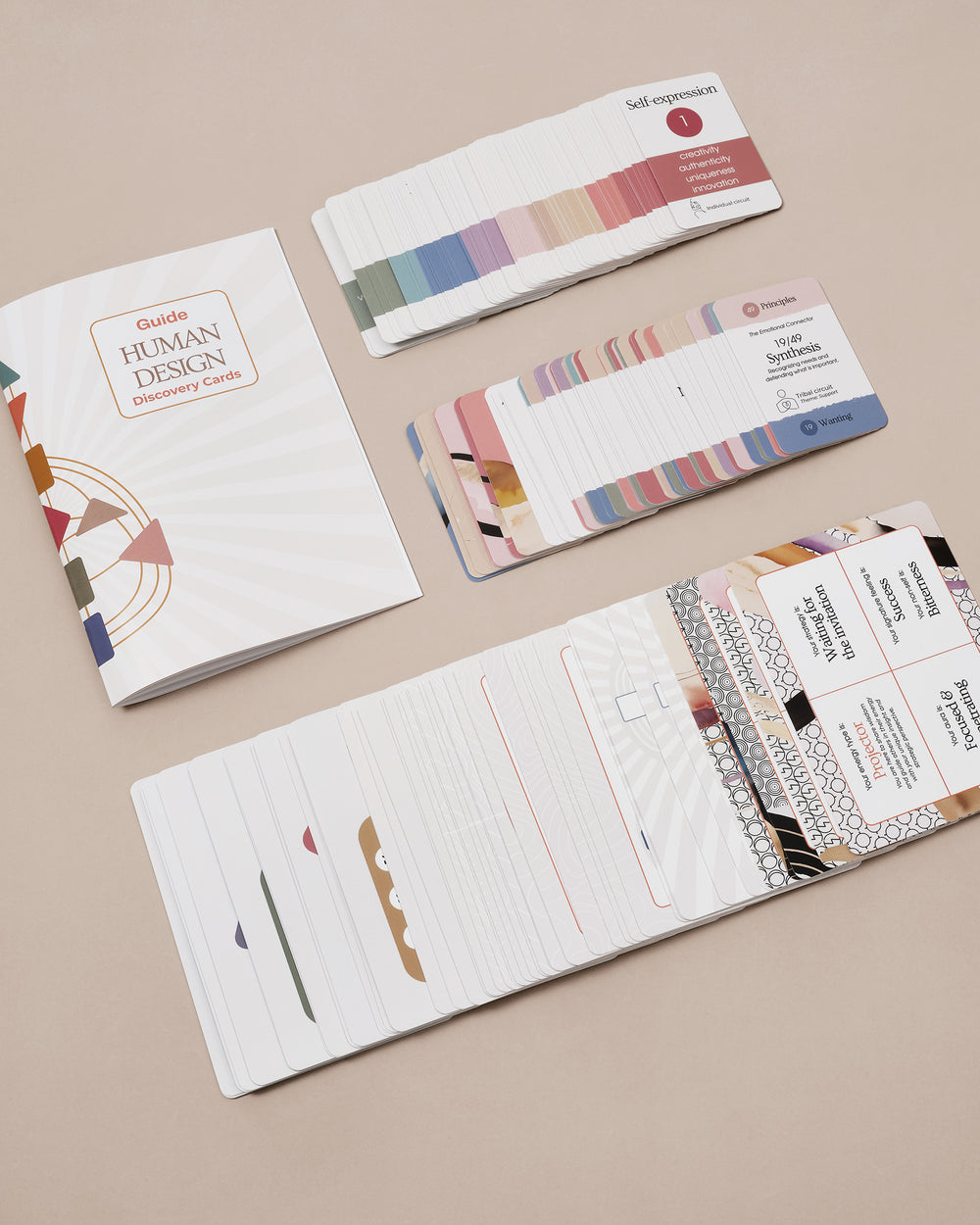 Close-up of Human Design cards showing gates and centres