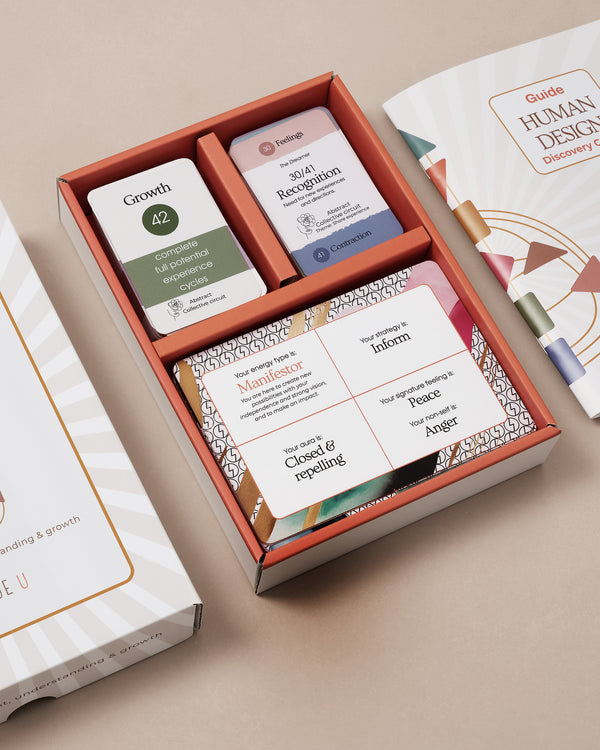 Close-up of Human Design cards showing gates and centres